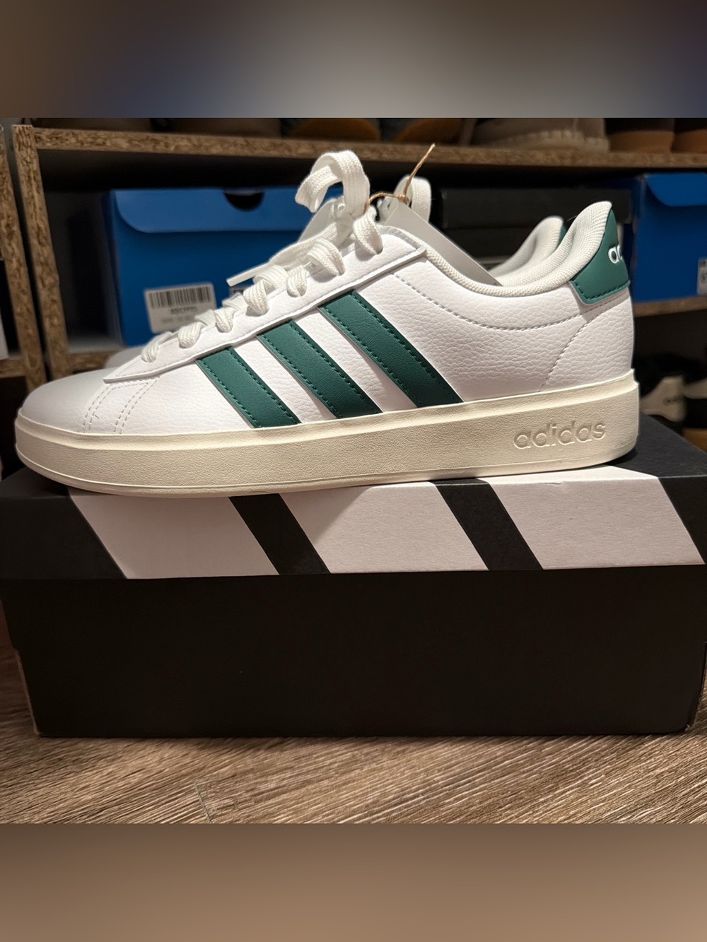 adidas White Low-Top Sneaker with Green Stripes
